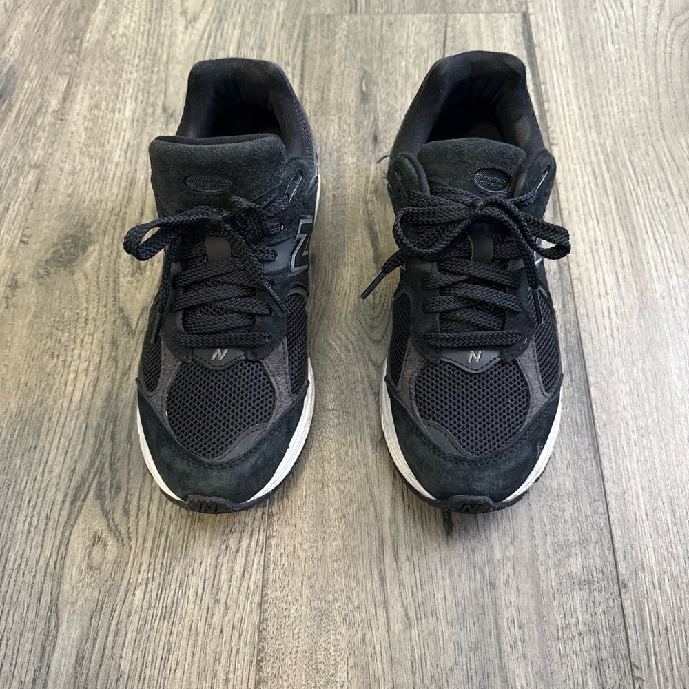 New Balance women’s Charcoal and Black Sneakers